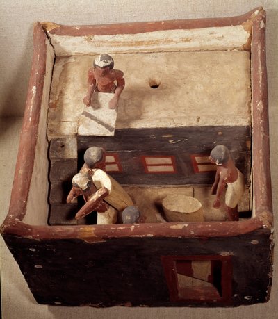 Egyptische oudheid: zoldermodel met schrijvers die de graanprijs registreren. Gemaakt van beschilderd hout. 12e dynastie, Middenrijk. Uit Assiut. Louvre Museum, Parijs door School Egyptian
