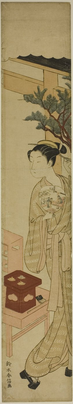 De serveerster Osen van het Kagiya-theehuis met een waaier door Suzuki Harunobu