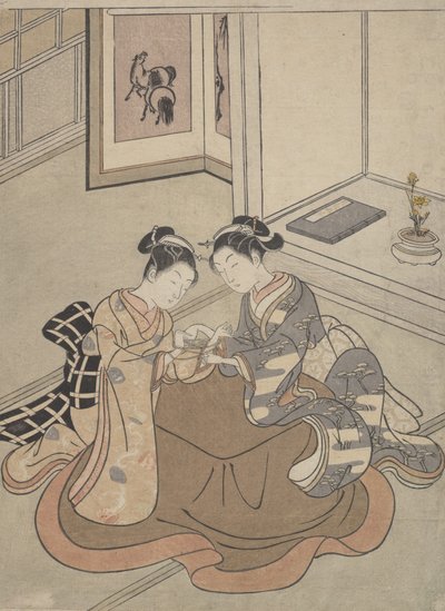 Twee jonge vrouwen zittend bij een kotatsu die kat-en-muis spelen, ca. 1765 door Suzuki Harunobu