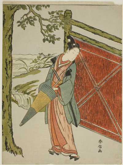 Jonge man met paraplu naast een hek door Suzuki Harunobu