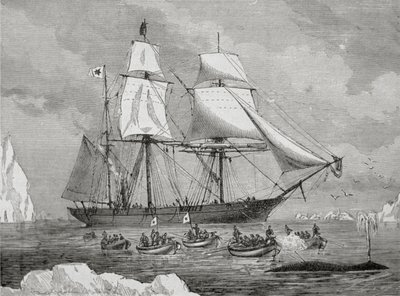 Een walvisvaarder met een boot vast aan een 