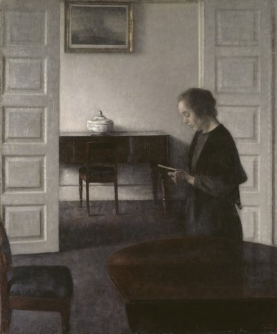Interieur met een lezende dame door Vilhelm Hammershoi
