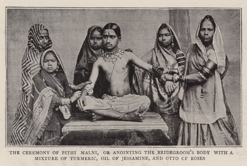 De ceremonie van Pithi Malni, of het zalven van het lichaam van de bruidegom met een mengsel van kurkuma, jasmijnolie en rozenolie door English Photographer