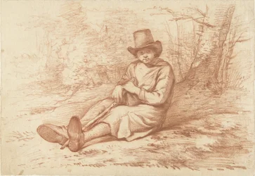 Zittende jongen met hoed en stok, bij een boom