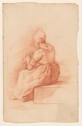 Zittende vrouw met muts, op de rug gezien