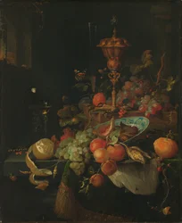 Stilleven met fruit en een beker op een hanenpoot