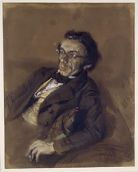 Dr. R. Eitner zittend op een sofa, halffiguur naar links