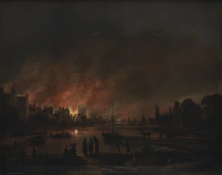 Brand in een dorp bij nacht