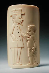 Plaquette met figuren van een Europese man en een Afrikaanse vrouw, Congo