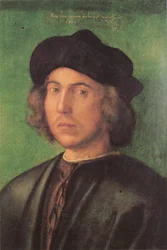 Portret van een jonge man
















 tegen een groene achtergrond