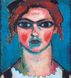 Jonge vrouw met groene ogen, ca. 1910