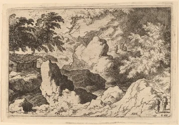 Drie mannen op een rots