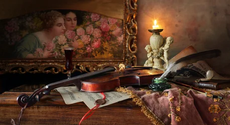 Stilleven met muziek bij kaarslicht
