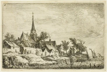 De kerktoren in het dorp aan zee
