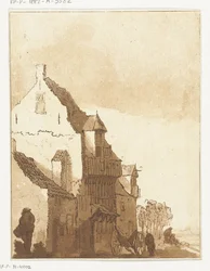 Huis met kruiwagen voor de deur