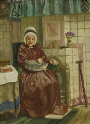 Oude vrouw bij de haard