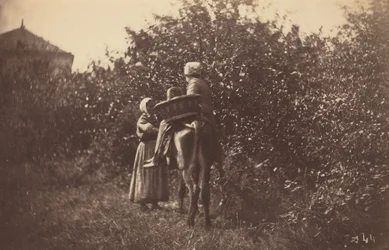 Twee vrouwen met ezel,eind jaren 1870 (foto)
