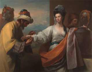 Rebecca ontvangt de armband bij de bron