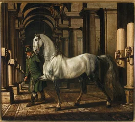 Staljongen die een paard leidt