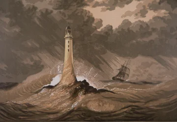 Vuurtoren waarschuwt schepen voor rotsen in storm op zee