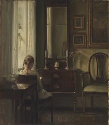 Interieur met een meisje dat leest