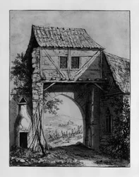 Poortgebouw met uitzicht op een landschap met ruïne