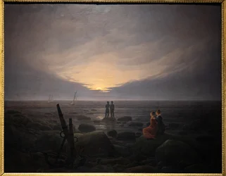 Maanopkomst boven de zee