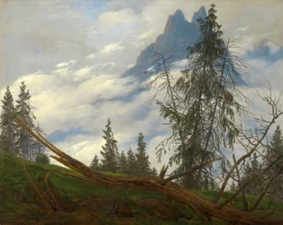 Bergtop met voorbijtrekkende wolken