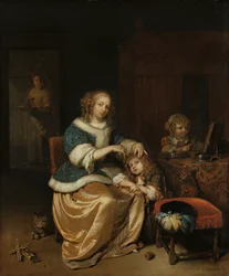 Interieur met een moeder die het haar van haar kind kamt, bekend als 