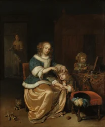 Interieur met een moeder die het haar van haar kind kamt, bekend als 