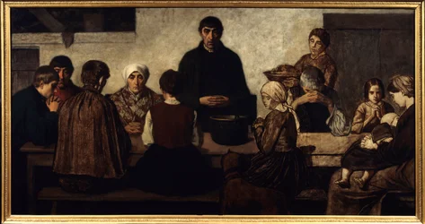 Benedicite Familie die aan tafel bidt