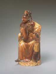 Een figuur van Guandi zittend, 14e-15e eeuw