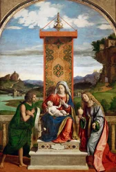 De Madonna en Kind met Sint Johannes de Doper en Maria Magdalena