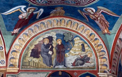 Het wonder van Sint Placide Sint Benedictus van Nursia, dankzij de tussenkomst van Sint Maur zijn eerste discipel, redt de jonge Placide die in de stroom van een meer is gevangen. Fresco door Meester Consolo (13e eeuw) Onderkerk. Klooster van Sint Benedett