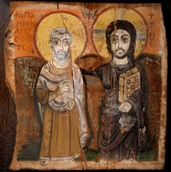 Koptische kunst: Christus en abt Mena. De heilige Menas (Minas, Mina, Mena, Mennas), Egyptische martelaar uit de 3e eeuw. Fragment van schildering op hout uit de 6e of 7e eeuw. Afmetingen: 57 x 57 cm. Van de vindplaats Baouit in Egypte.