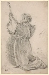 Knielende monnik met crucifix