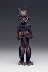 Rituele container in de vorm van een staande mannelijke figuur