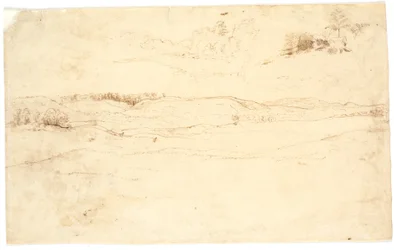 Uitzicht over een landschap met kale heuvels