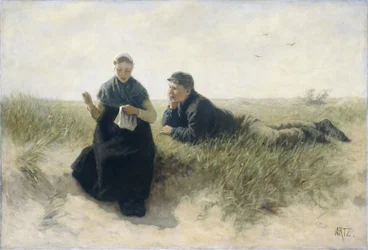 Jongen en meisje in de duinen