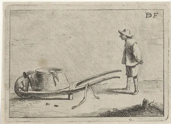 Man bij een kruiwagen
