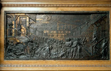 Het wonder van Sint Antonius, het opnieuw aanhechten van de voet, paneel van het hoofdaltaar (bronsreliëf)