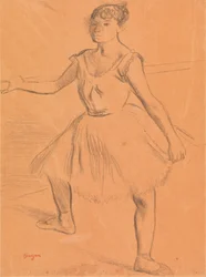 Ballerina staand aan een bar