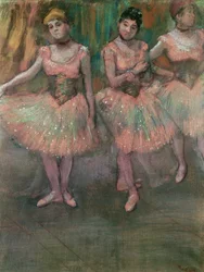 Dansers met zalmkleurige rokken