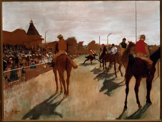 De parade of renpaarden voor de tribunes