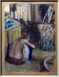 Hurkende vrouw