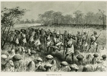Vertrokken uit Kalassa, de verteller reiziger in zijn stoel met dragers. Gravure door Riou ter illustratie van het verhaal Les lacs de l