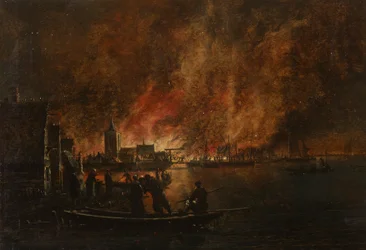 Nachtelijk vuur boven Nederlandse stad