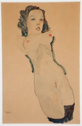 Liggende Naakt met Zwarte Kousen