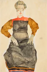 Vrouw in zwart schort