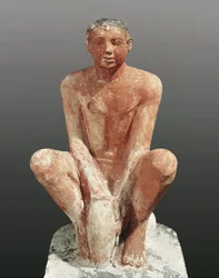 Egyptische beschaving, geschilderd kalkstenen beeld dat een man toont die klei modelleert, uit Saqqara, Egypte, ca. 2465 5e eeuw v.Chr. (kalksteen)